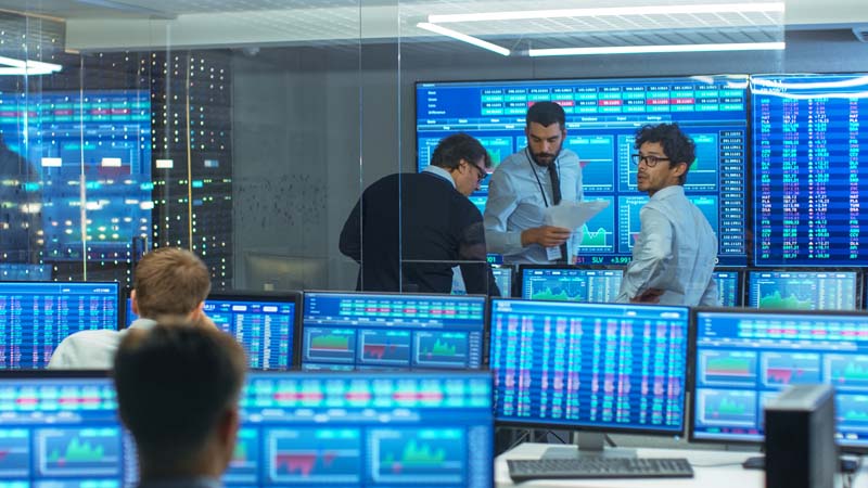 Investment company employees working
