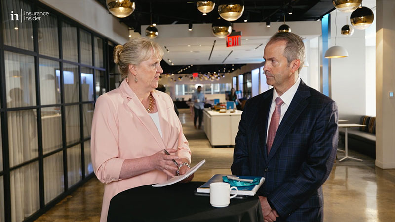 Marc Adee in interview with woman