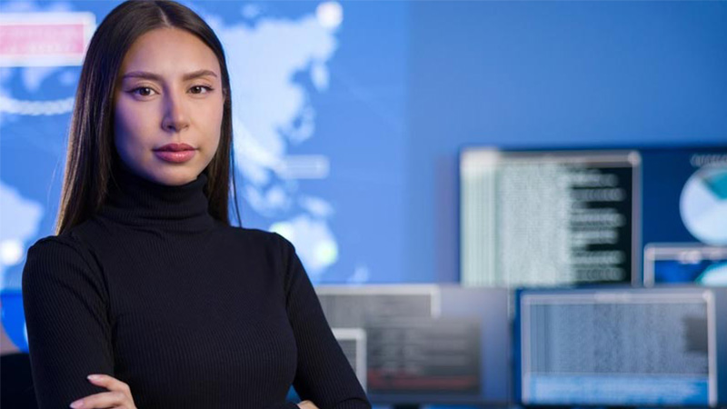 Woman in front of computers